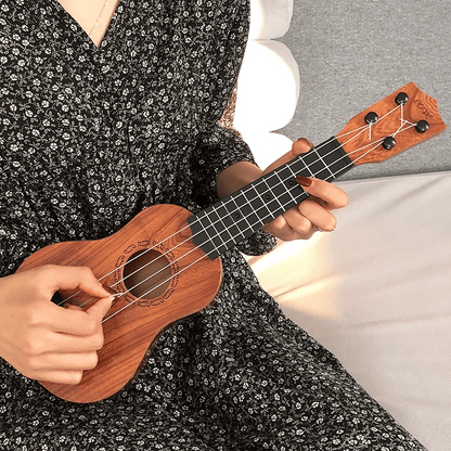 4‑String Wooden Guitar – 35cm with Spare Strings